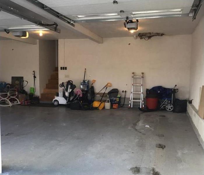 garage with ceiling damage from water 